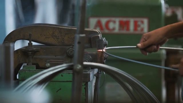 Forming wire rings on an ACME machine